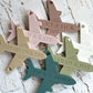 plane shaped fridge magnet save the dates engraved with couples names and wedding date
