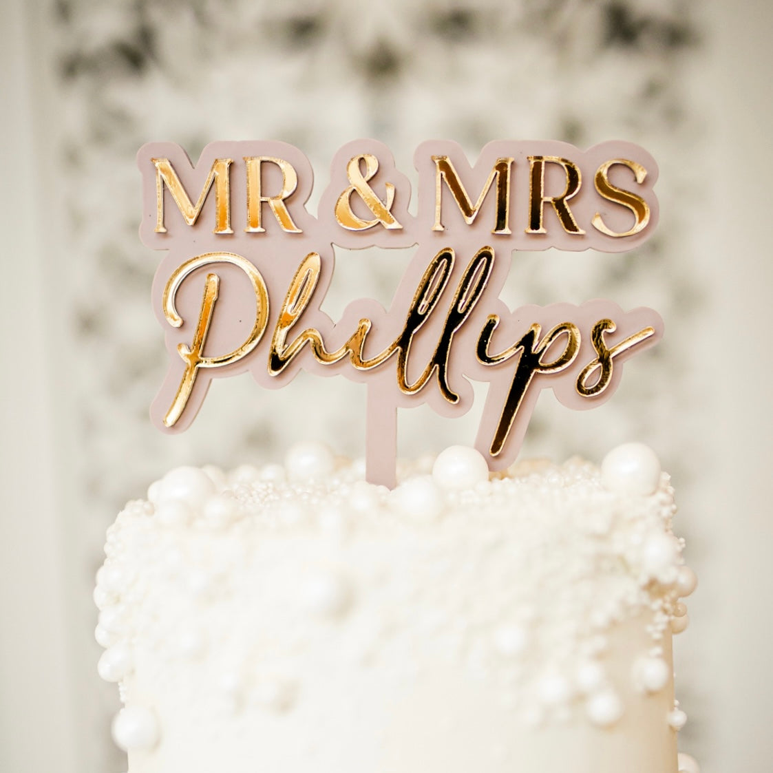 Dusky pink acrylic wedding cake topper with rose gold acrylic lettering, Mr and Mrs personalised with surname, acrylic premium cake topper
